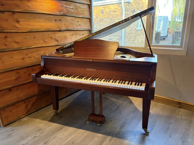 Hupfield baby grand