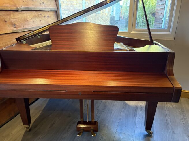 Hupfield baby grand