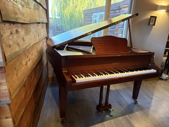 Hupfield baby grand